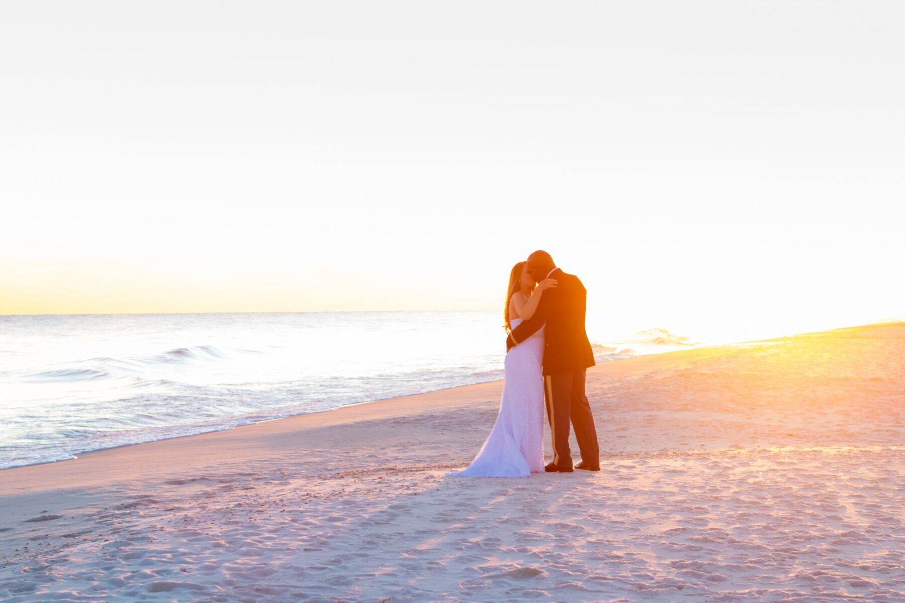 Couple Kissing On Beach